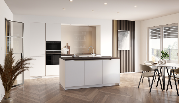 Cuisine moderne avec îlot central blanc, plancher en bois à chevrons, table ronde et chaises, éclairage encastré au plafond.